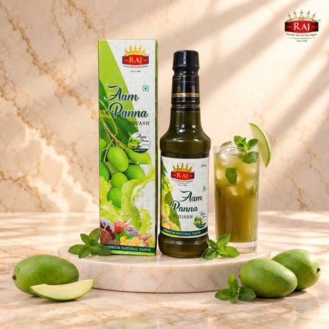 RAJ Aam Panna Squash bottle with a glass of chilled aam panna refreshing drink with ice and mint