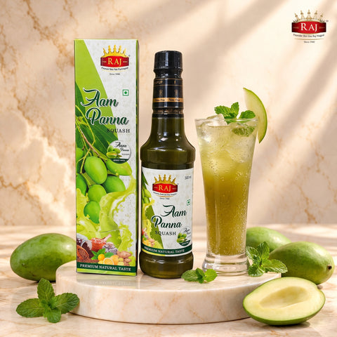 Sparkling mango mocktail made with RAJ Aam Panna Squash and soda in a tall glass with ice