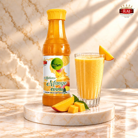 crush-milkshake.png	RAJ Pulpy Tree Alphonso Mango Crush bottle with mango milkshake and fresh mango pieces on a marble podium