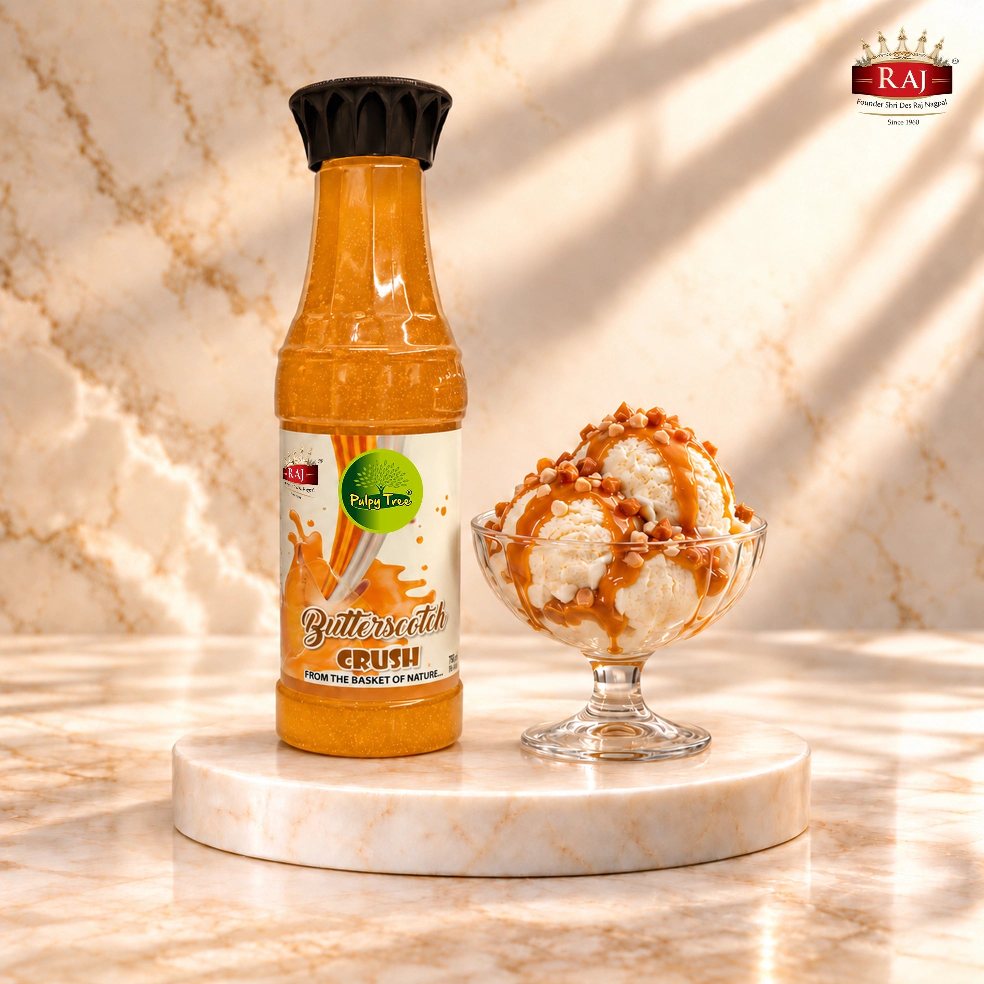 RAJ Pulpy Tree Butterscotch Crush bottle with vanilla ice cream and butterscotch topping