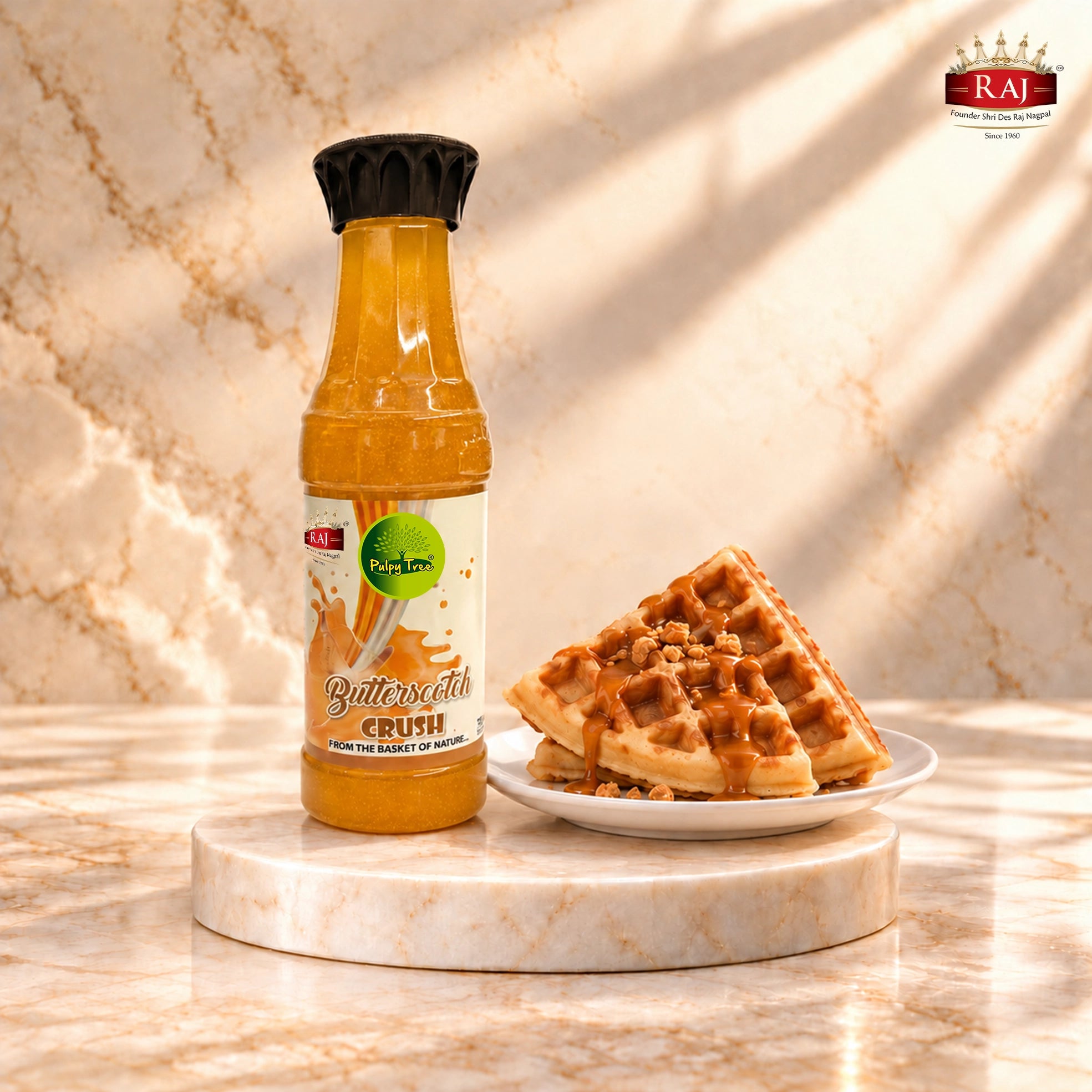 RAJ Pulpy Tree Butterscotch Crush bottle beside golden waffles with butterscotch drizzle