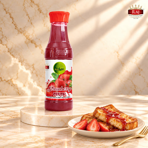 Strawberry Crush bottle beside French toast topped with strawberry drizzle and fresh strawberries