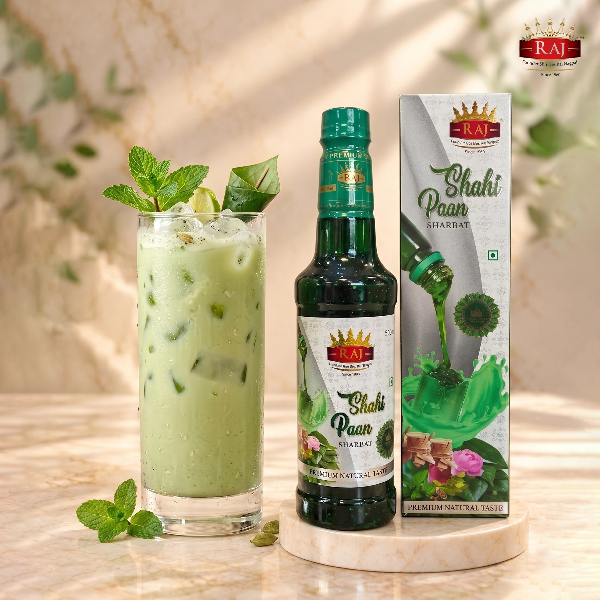 Chilled Shahi Paan Cooler in a tall glass with RAJ Shahi Paan Sharbat 500 ml bottle 