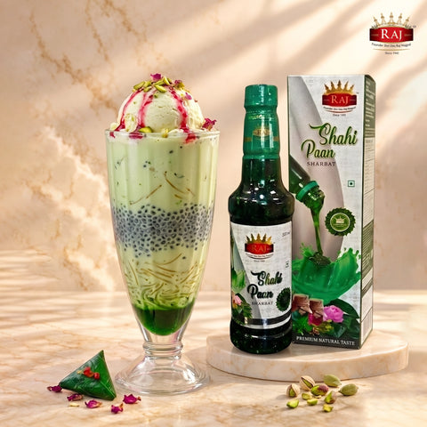 Shahi Paan Falooda layered with vermicelli, basil seeds and ice cream beside RAJ Shahi Paan Sharbat 500 ml bottle and carton