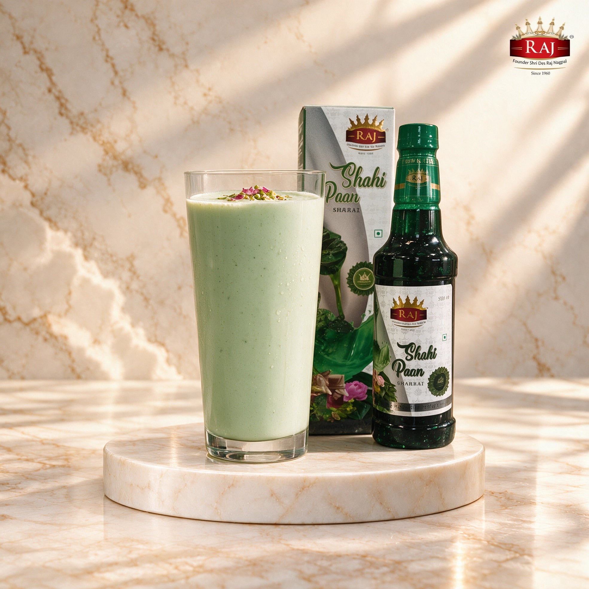 Refreshing Shahi Paan Lassi in a tall glass with RAJ Shahi Paan Sharbat 500 ml bottle and carton