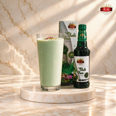 Refreshing Shahi Paan Lassi in a tall glass with RAJ Shahi Paan Sharbat 500 ml bottle and carton